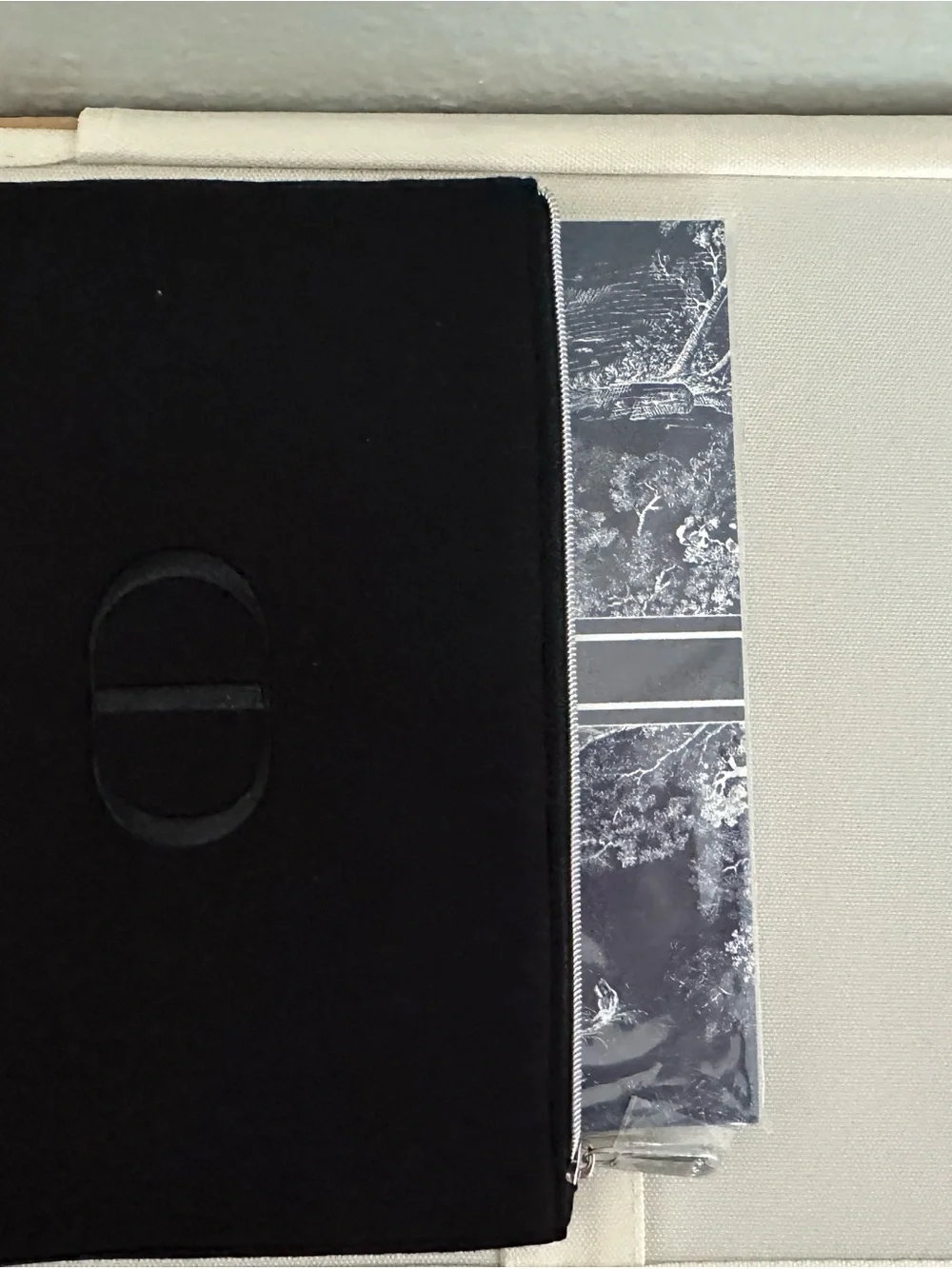 Dior Black CD Zip Pouch and notebook